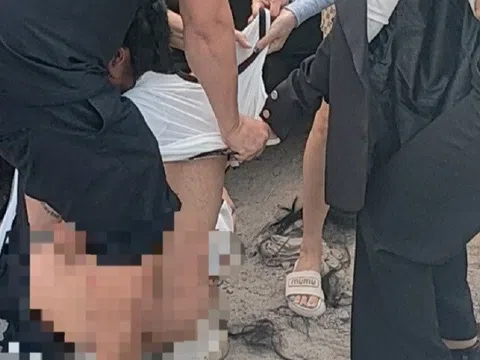 Bình Dương: Nhóm người đánh, cắt tóc, lột đồ người phụ nữ giữa đường